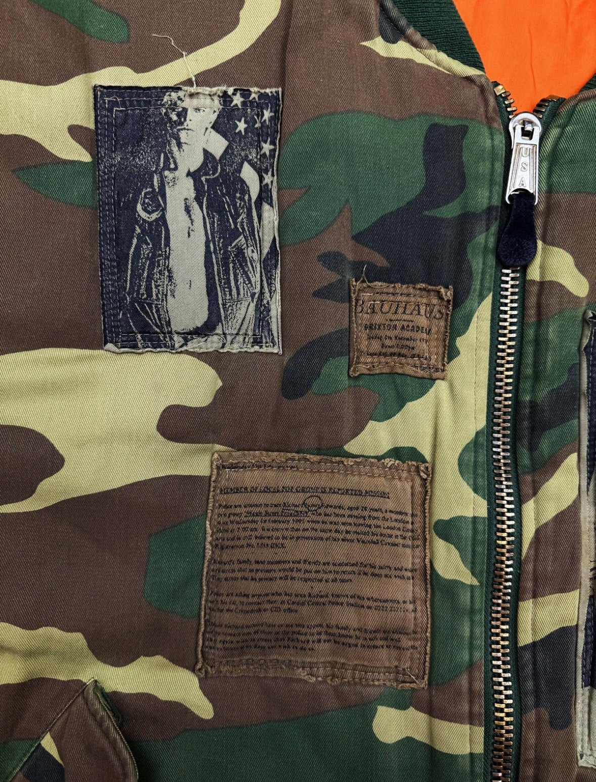 AW01 Raf Simons Riot Riot Camouflage
Patched Bomber Jacket - Private property 