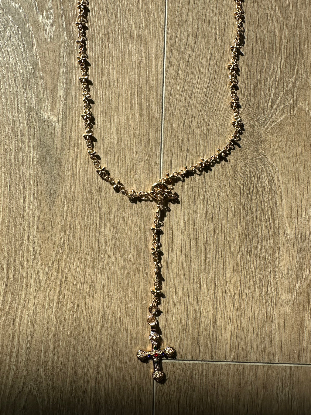Gold cross necklace - Private property 