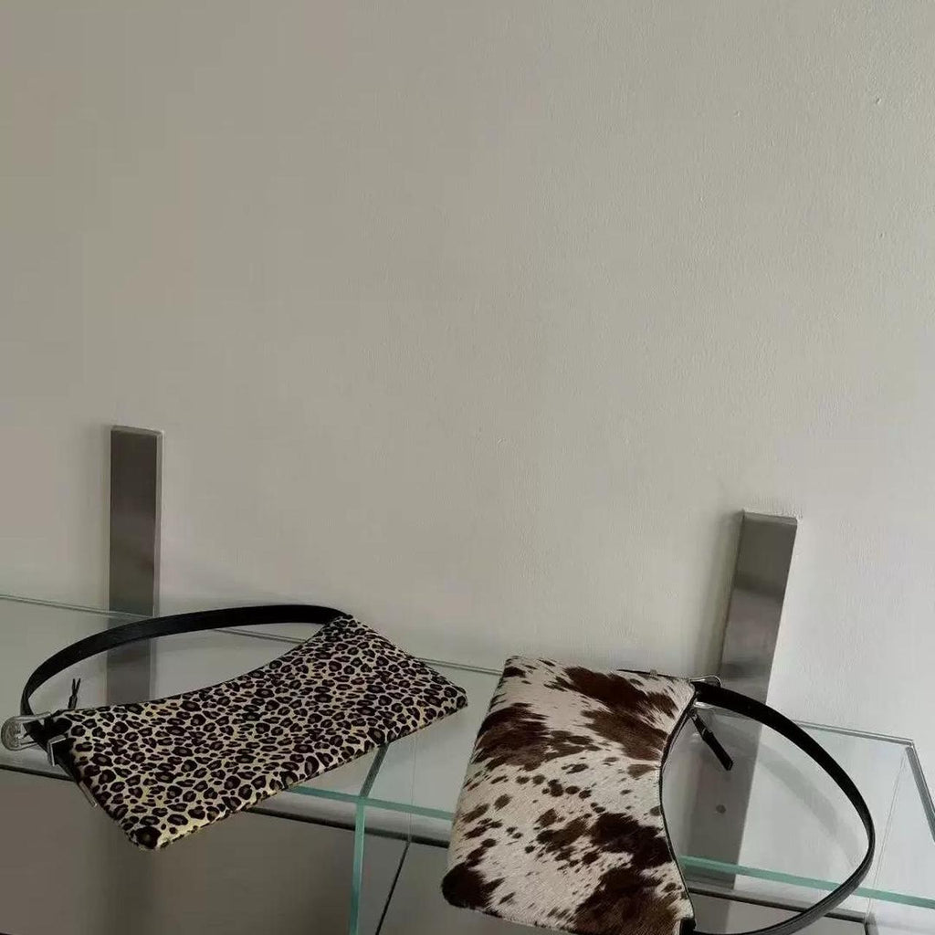 brown and white cow print shoulder Bags